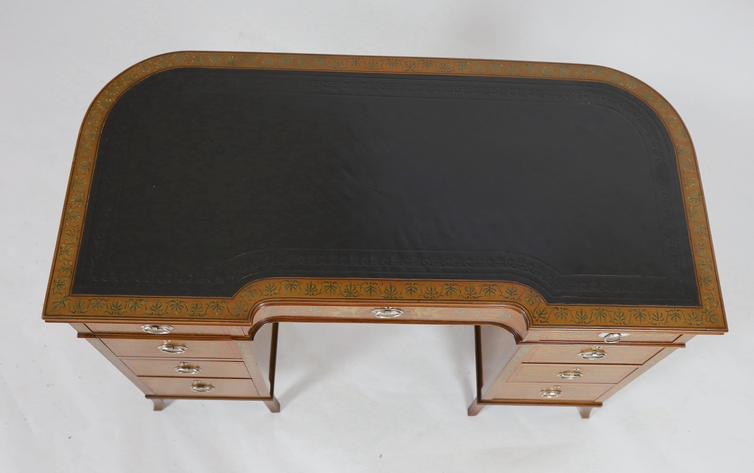 An Edwardian painted satinwood kneehole desk, W.110cm D.53cm H.75cm